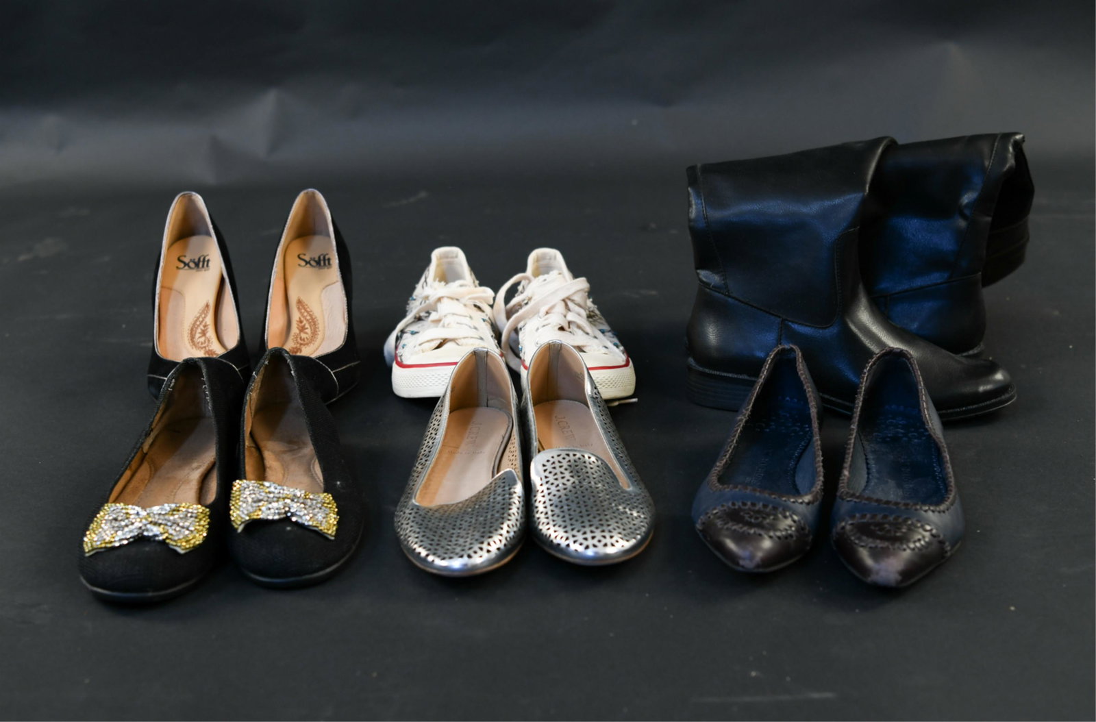 GROUPING OF LADIES SHOES: Including a pair of vegan leather riding boots, beaded sneakers, Soft heels, Jack Rogers flats, J. Crew flats, Aerosoles flats with bows. Size: 7.5-8 Condition: Lightly worn.
