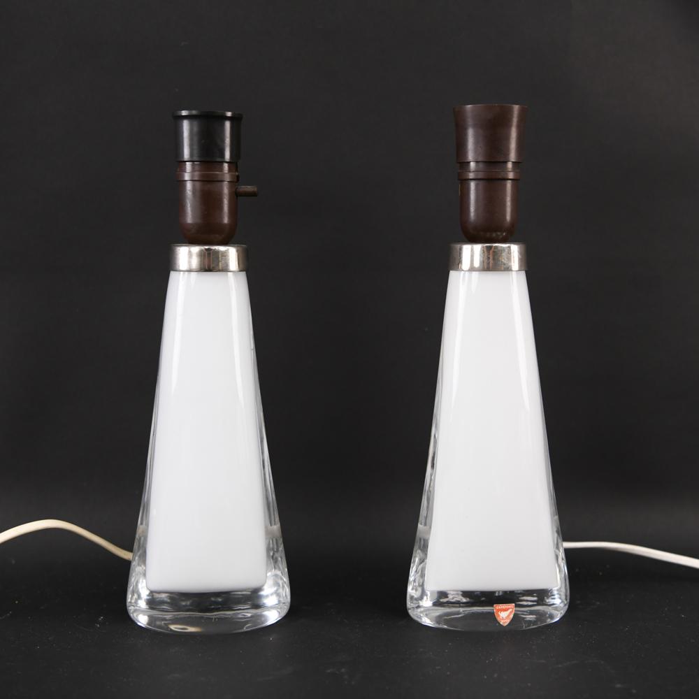 (2) CARL FAGERLUND FOR ORREFORS SWEDISH LAMPS: Both signed, one with decal. Dimensions: H 11.75" x W 4"x D 2.25" Condition: Needs to be re-wired (European plug). Showing overall light use wear. GA057