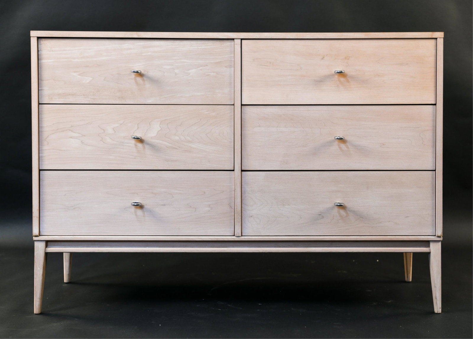 PAUL MCCOBB FOR PLANNER GROUP 6 DRAWER DRESSER: Labeled in top left drawer. Dimensions: H 33.25" x W 48.5" x D 19.5" Condition: Finish professionally stripped. Missing 2 glides under front legs.