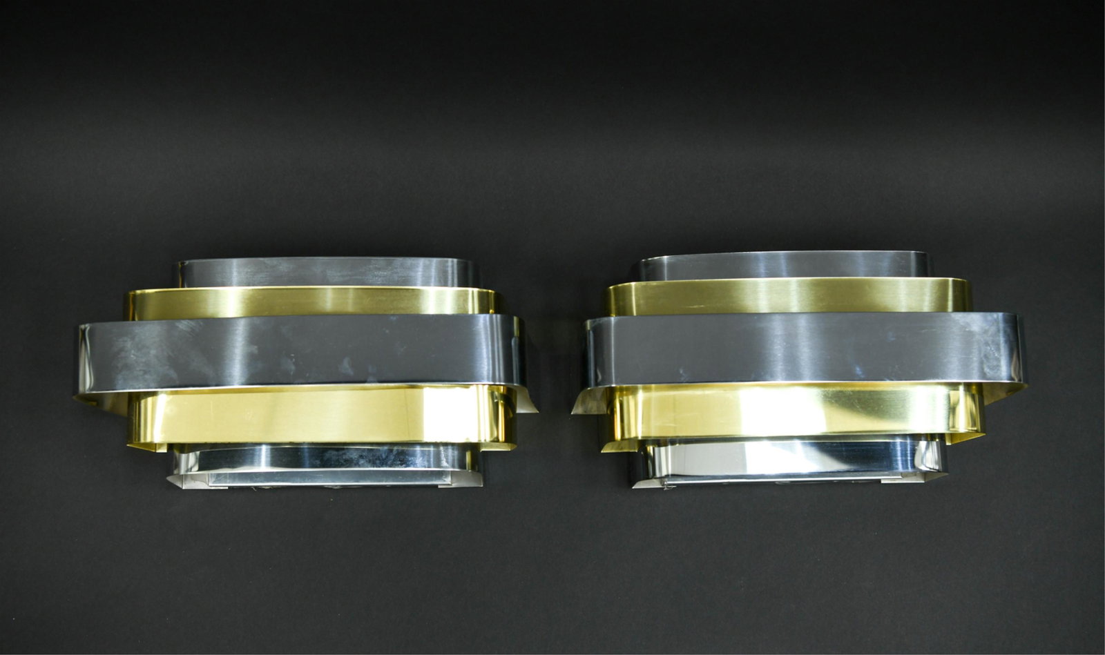 PAIR OF LIGHTOLIER BRASS AND CHROME SCONCES: Dimensions: H 7" x W 14"x D 5.5" Condition: Showing light signs of use and handling including finish wear to some edges and light scratches.