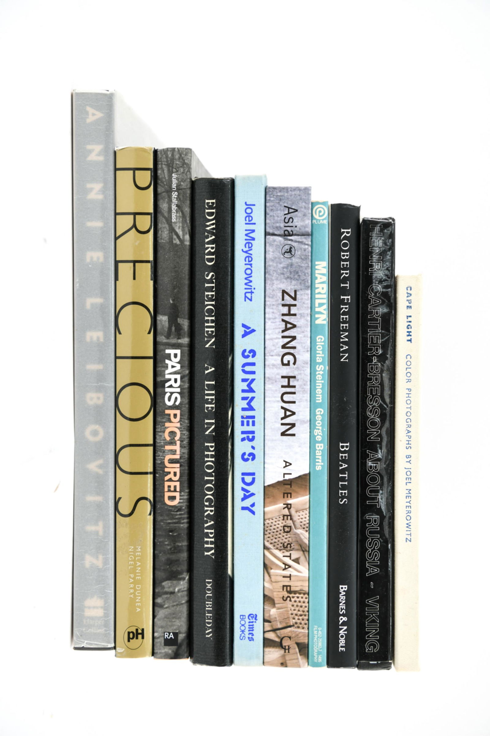 (10) PHOTOGRAPHY BOOKS: Including Joel Meyerowitz "A Summer's Day" signed by the photographer and dated 1985. Other by Joel Meyerowitz signed and dated. Dimensions: (Largest) H 13.25" x W 11.25" Condition: Good used conditio