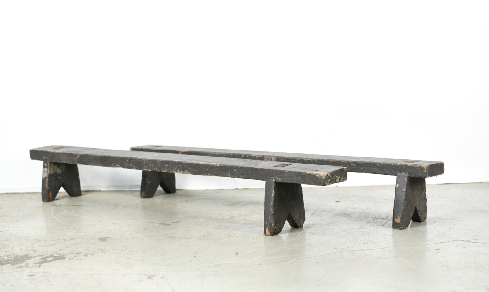 (2) WOODEN KNEELING BENCHES: Dimensions: (Larger) H 7.5" x W 49" x 4.25" Condition: Showing obvious signs of use including chips and losses. Sturdy.
