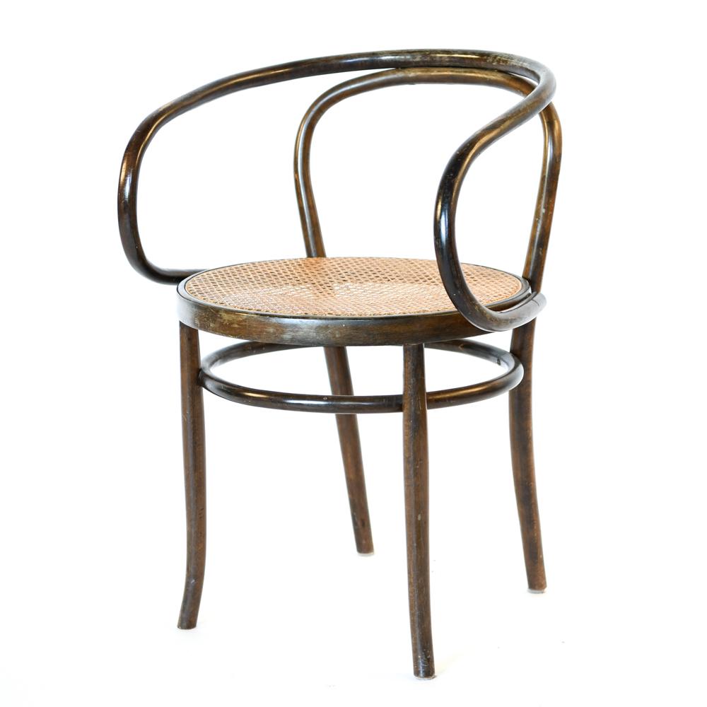 BENTWOOD CHAIR MANNER OF THONET: Caned seat. Dimensions: H 30" x W 19.5" x D 18.25" x SH 18.25" Condition: Finish wear to frame. Wear consistent with age and use.