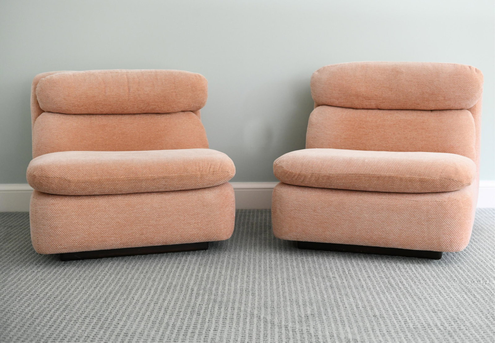 PAIR OF MID-CENTURY SLIPPER CHAIRS: Dimensions: H 27" x W 30" x D 36" x SH 15" Condition: Some areas with sun fading including normal signs of light use.