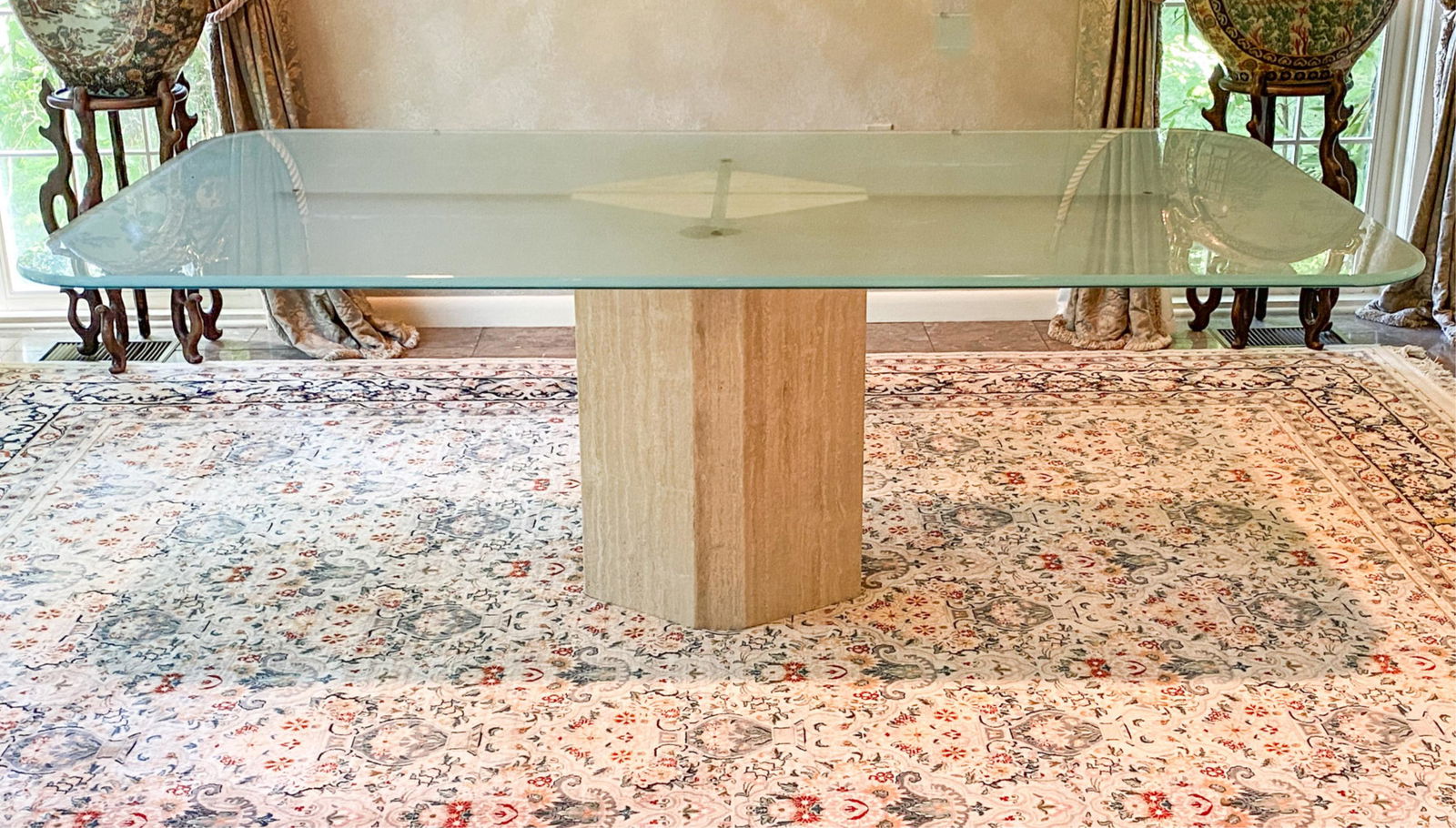 ITALIAN TRAVERTINE & GLASS DINING TABLE: Dimensions: H 29" x W 77" x D 44" Condition: Few small scratches to base. Light patina to brass cross beam.
