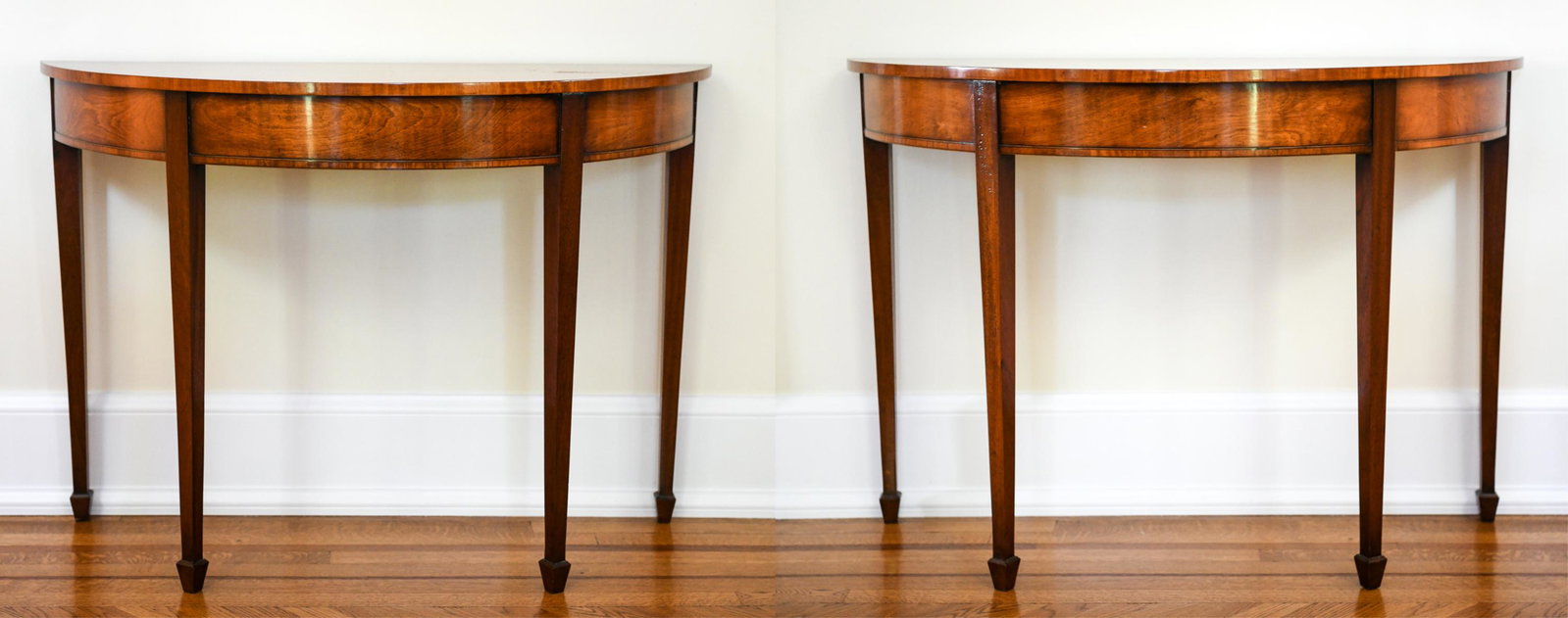 PAIR OF ENGLISH INLAID DEMI LUNE CONSOLE TABLES: Contemporary. Dimensions: H 32" x W 45.25" x D 19" Condition: Light signs of use.