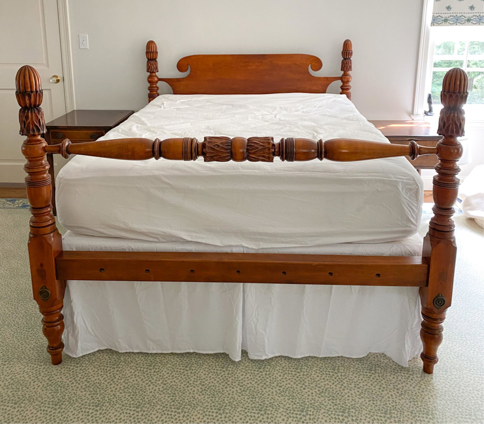 CARVED PINEAPPLE LOW POST BED: C. 1840, in maple with a rich warm patina, had been re-sized to a standard queen size. With receipt for price of $3200. Dimensions: (Headboard) H 50" x W 64" x D 4" Condition: Very light signs of use.