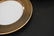 LIMOGES & FITZ FLOYD PORCELAIN PLATES GROUPING - 12