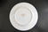 LIMOGES & FITZ FLOYD PORCELAIN PLATES GROUPING - 9
