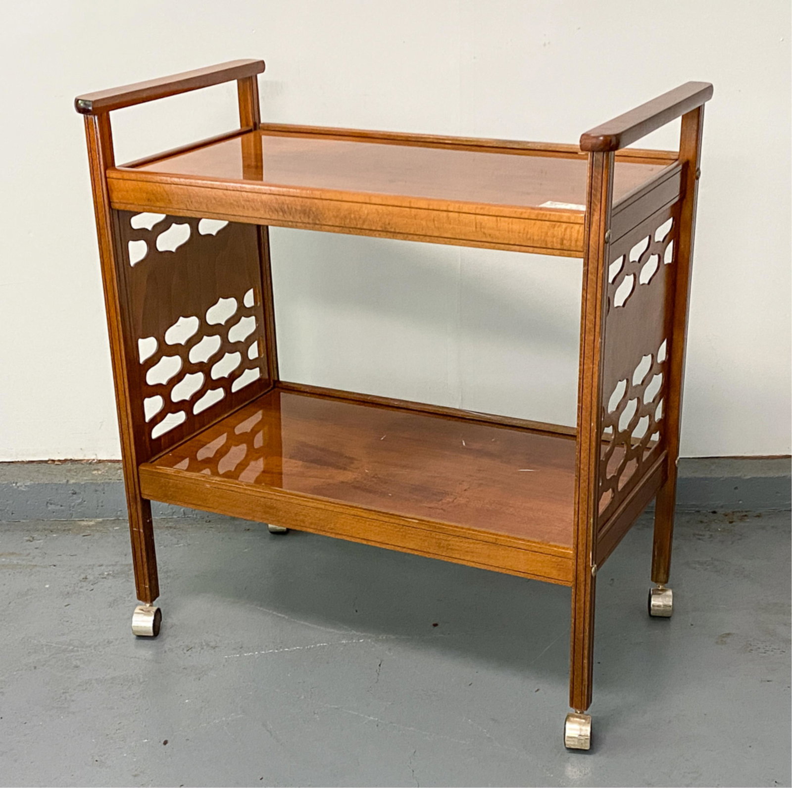 BAR CART: Dimensions: H 33.25" x W 30.75" x D 16.75" Condition: Label adhered to top. Separation to joints. Some white paint streaks to lower tier. Surface scratches, finish wear.