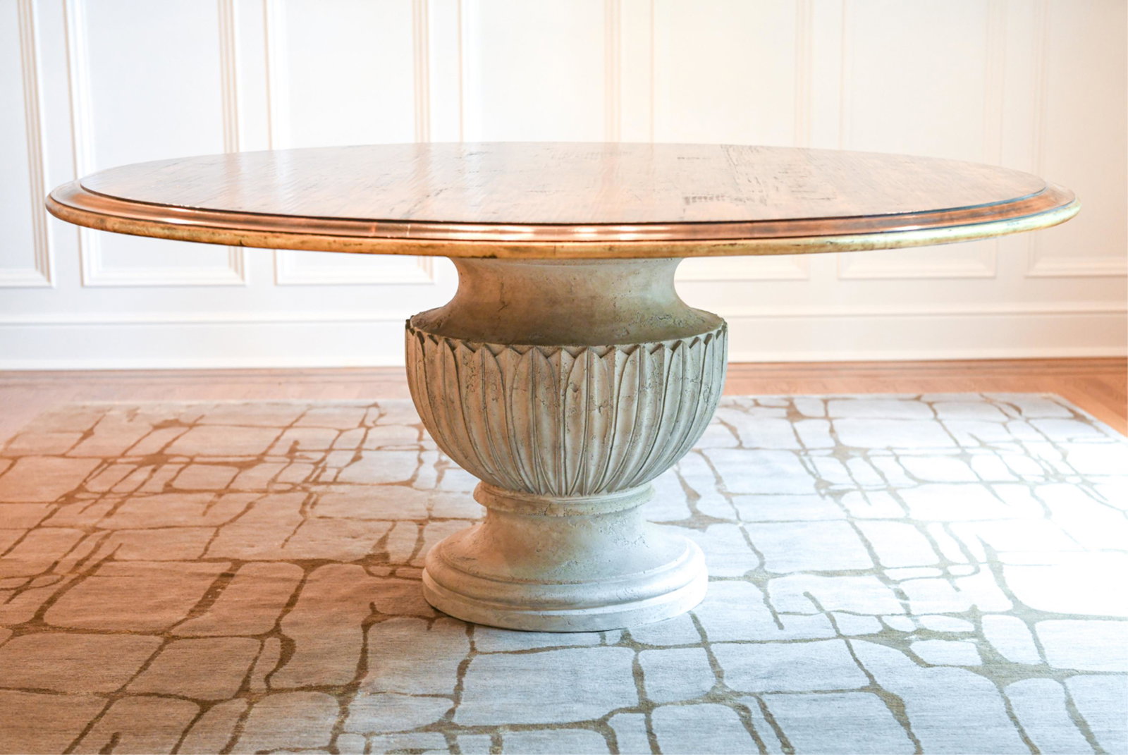 SWAIM PEDESTAL BASE ROUND DINING TABLE: Model 795-8-72-W. From the Platinum Occasional Collection. Cast limestone and wood. Pedestal base form. Dimensions: Base: H 29.5" x Dia: 26" Top: Dia: 71.5" Condition: Only one very minor chip along t