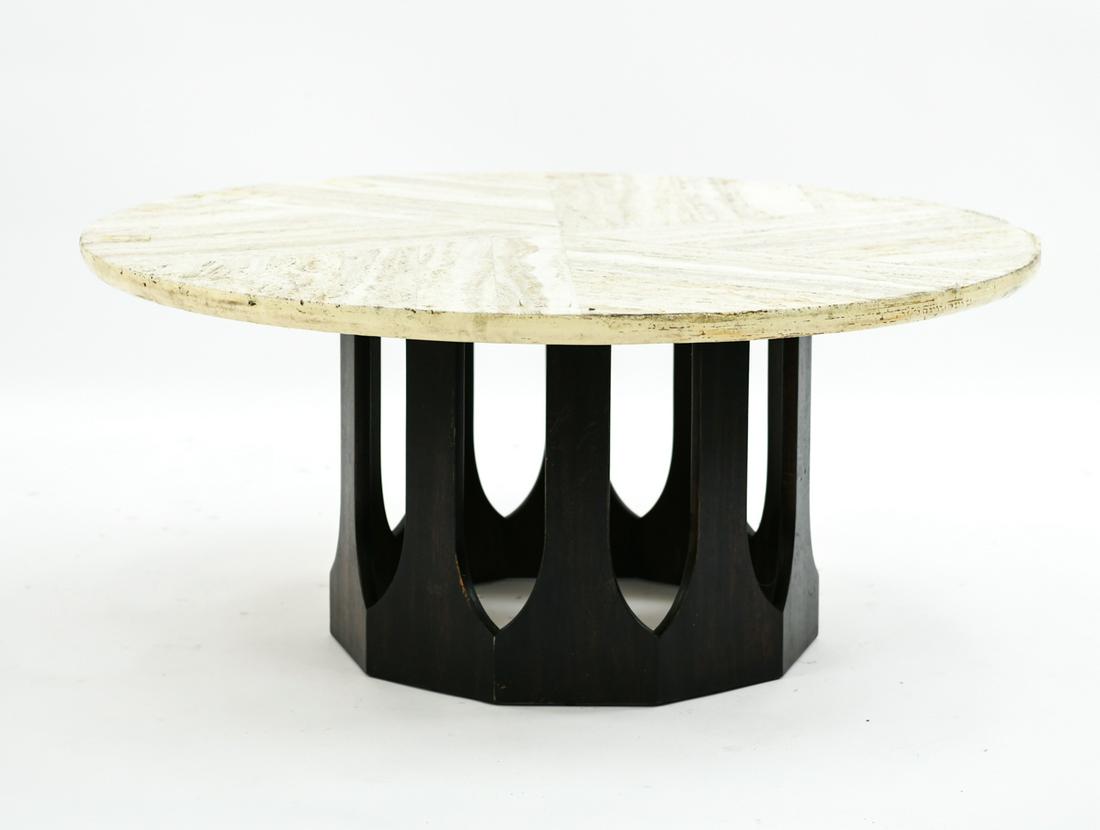 HARVEY PROBBER TRAVERTINE COFFEE TABLE: Dimensions: H 17.25" x Dia. 42" Condition: Wear to edge. Tape residue on surface underside and edge. Needs hardware in order to secure top to base.