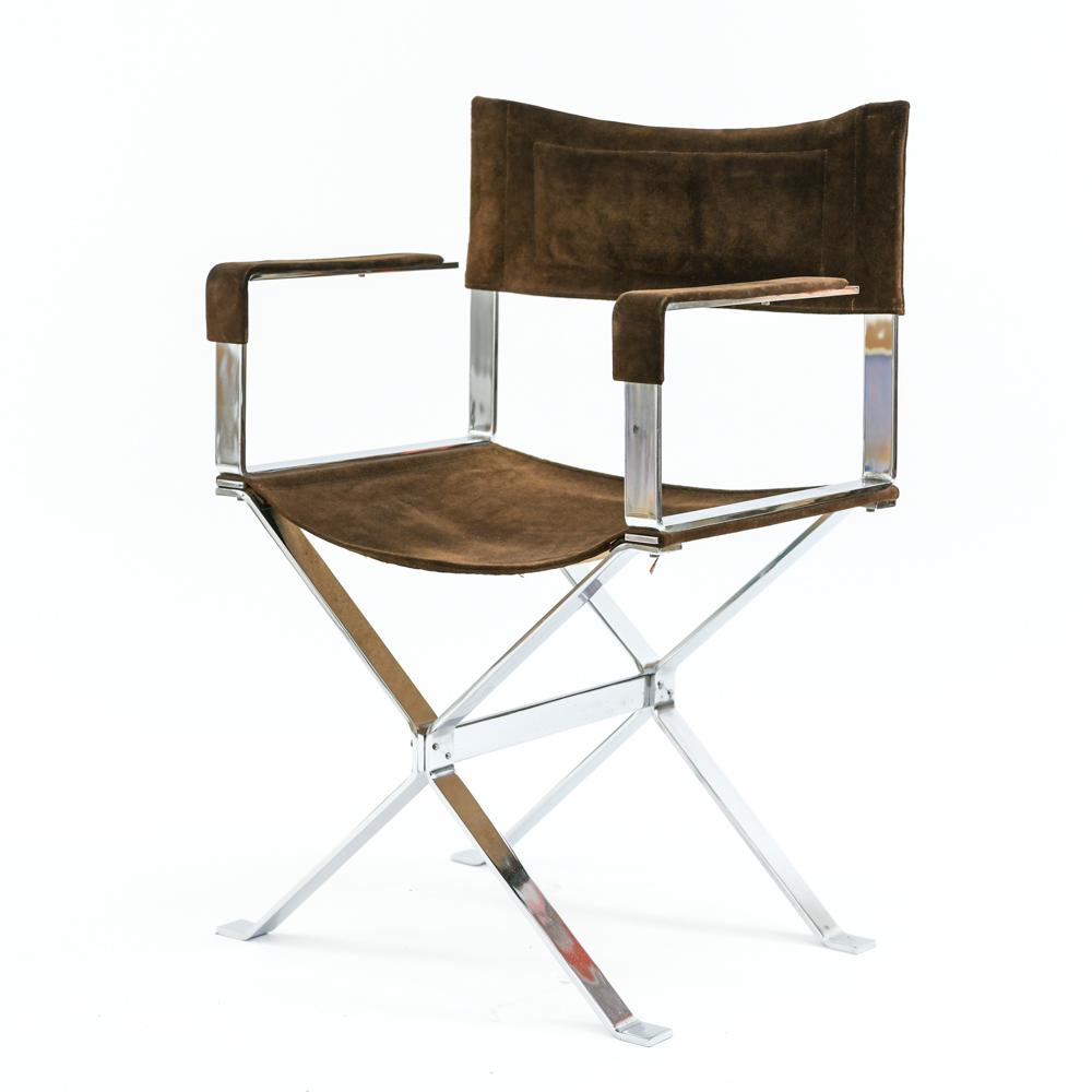 ALESSANDRO ALBRIZZI CAMPAIGN ARMCHAIR: Chrome frame, original brown suede, c. 1970. Dimensions: H 35" x W 23.25" x D 17" x SH 19" Condition: Wear to chrome finish including areas with various degrees of pitting, mostly light. Wear consiste