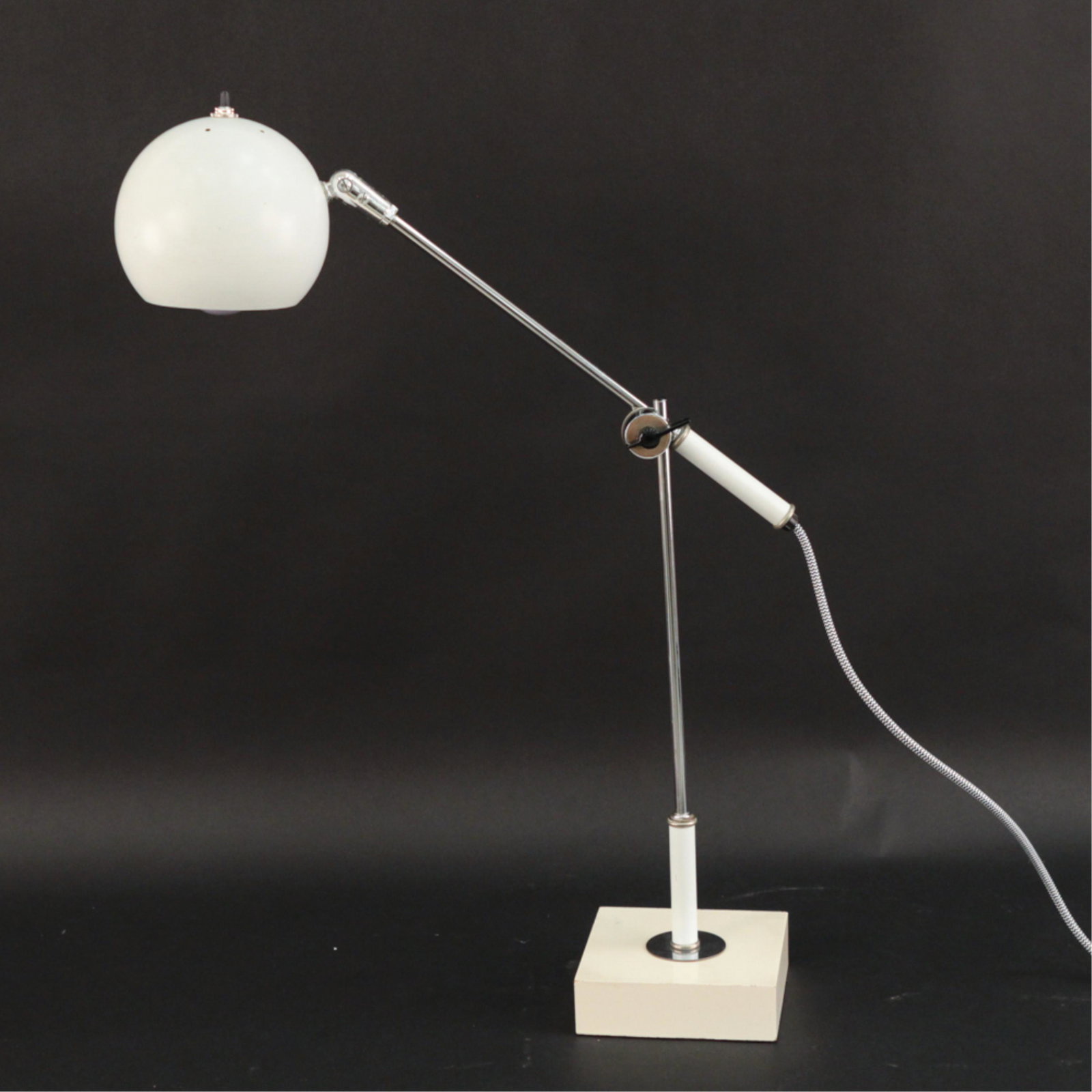SONNEMAN ARTICULATING EYEBALL TABLE LAMP: Recently professionally rewired.Dimensions: (Tallest) H 30" x W 14" x D 8.5"Condition: Showing signs of use including wear to base paint finish. Couple small marks to shade.