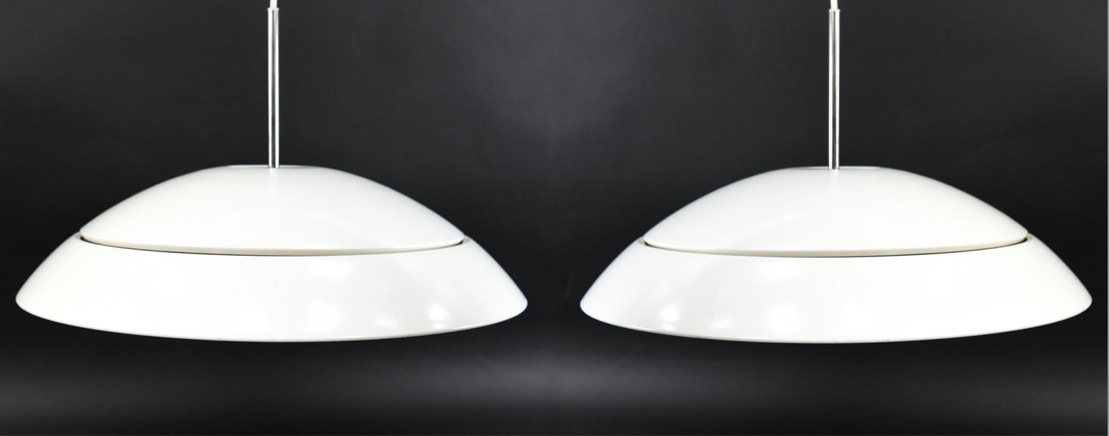 PAIR OF THORN LIGHTING MID-CENTURY PENDANT LIGHTS: Dimensions: H 12.75" x Dia. 22" Condition: Minor surface scratching. Wear consistent with age and use. H131