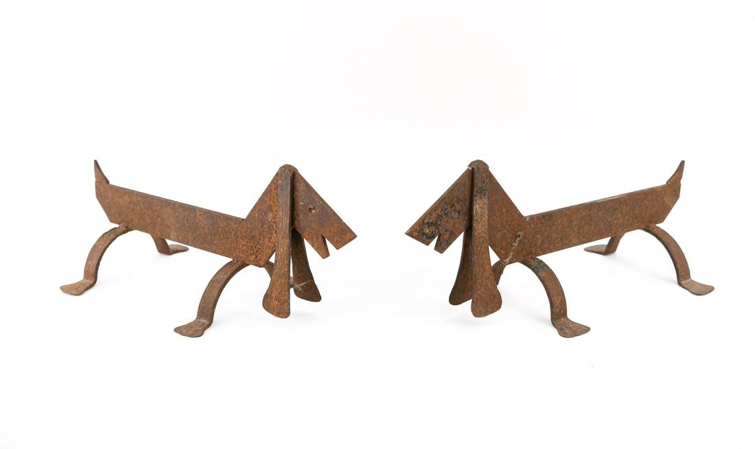 (2) ATTR. EDOUARD SCHENCK IRON FIRE DOG ANDIRONS: Dimensions: H 8.25" x W 19.5" x D 9.5" Condition: Normal iron rust.