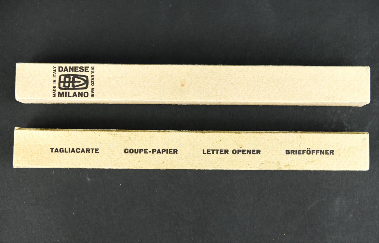 (2) ENZO MARI LETTER OPENERS: Marked on boxes and blades. Dimensions: (Box) H .75" x W 8.5" x D .5" Condition: Light signs of handling.