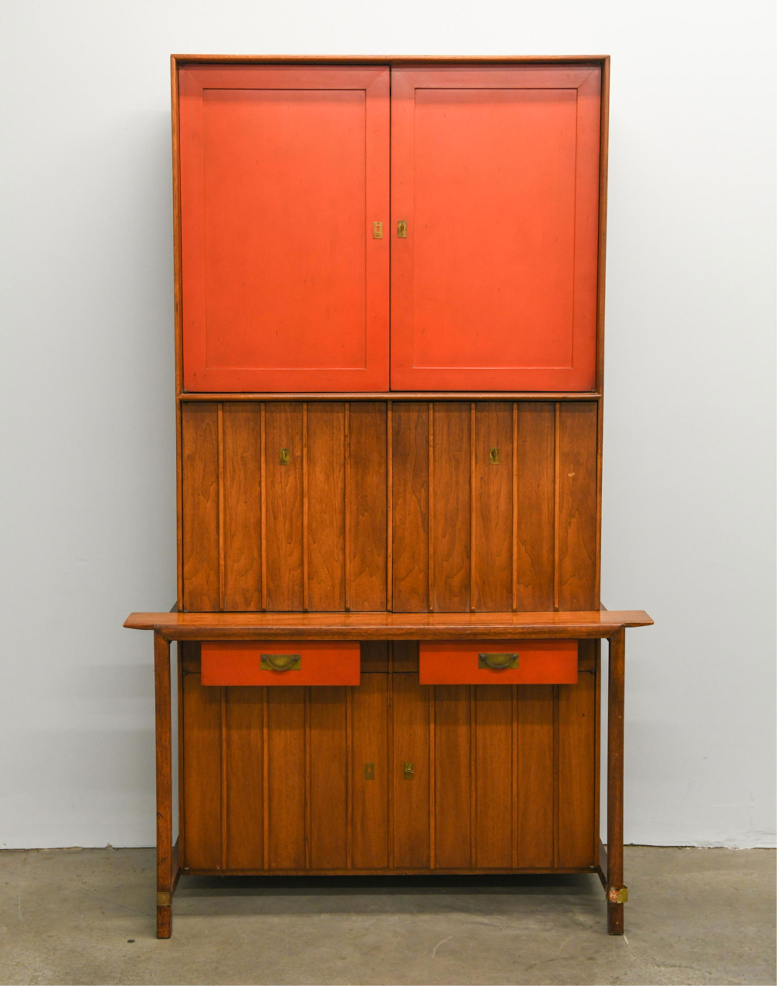 HICKORY FURNITURE MID-CENTURY SECRETARY CABINET: Marked inside drawer: Hickory Furniture Co. Two-part construction. Dimensions: H 81.25" x W 49.25" x D 21" Condition: Damage to brass leg trim on proper left front. Few rubs and light scratches. Some