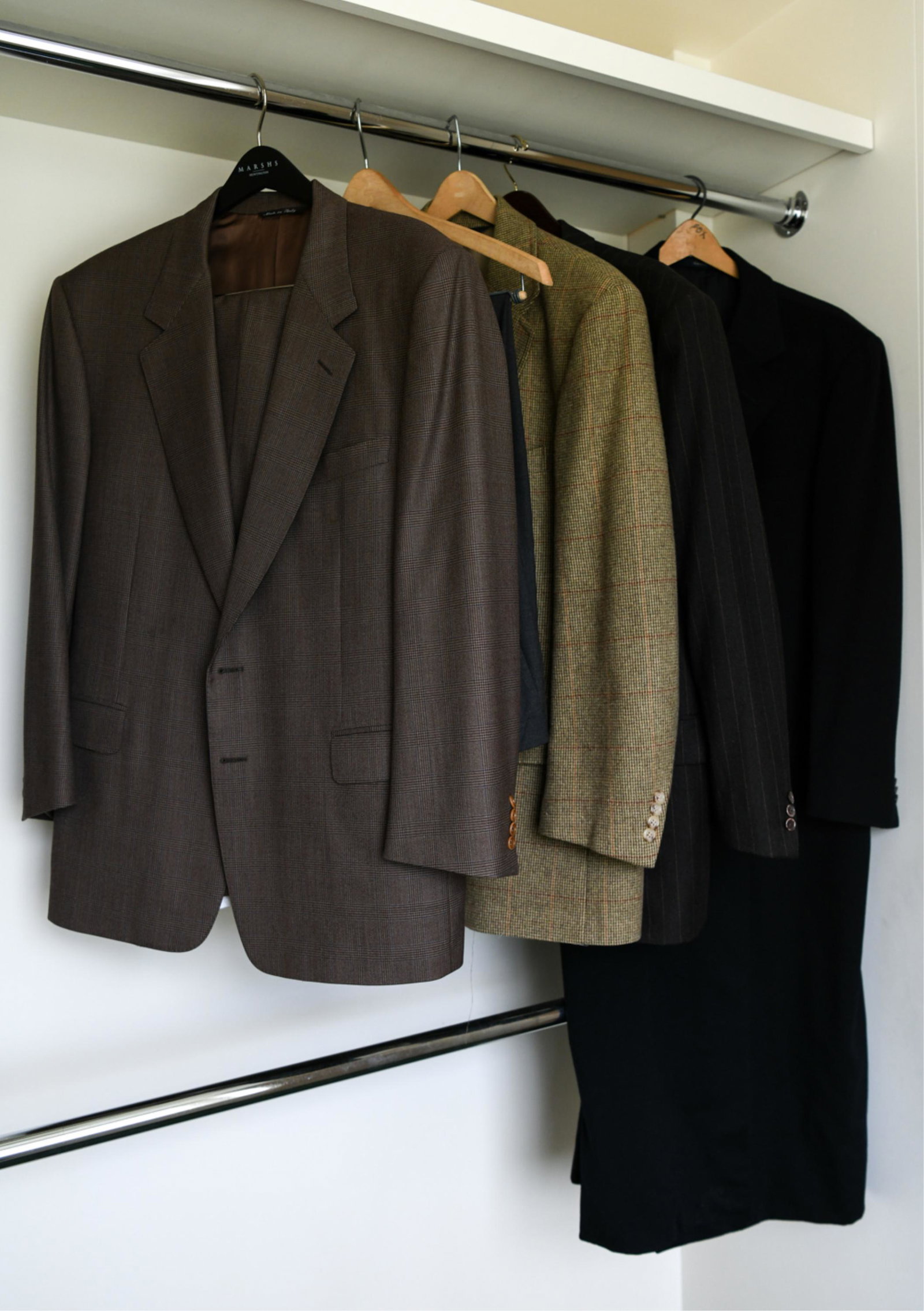 GROUPING OF MENS DESIGNER CLOTHING: Including Polo by Ralph Lauren, Brioni and Zegna, Italian, etc.Sizes: 38" R, etc.Condition: Lightly used, wearable.