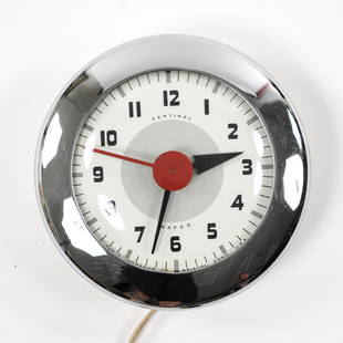 HENRY DREYFUSS SENTINEL WAFER CLOCK: Designed in 1940. Marked verso: The E. Ingraham Co., Bristol, CT. Dimensions: Dia. 7" x D 1.75" Condition: Good working and cosmetic condition.
