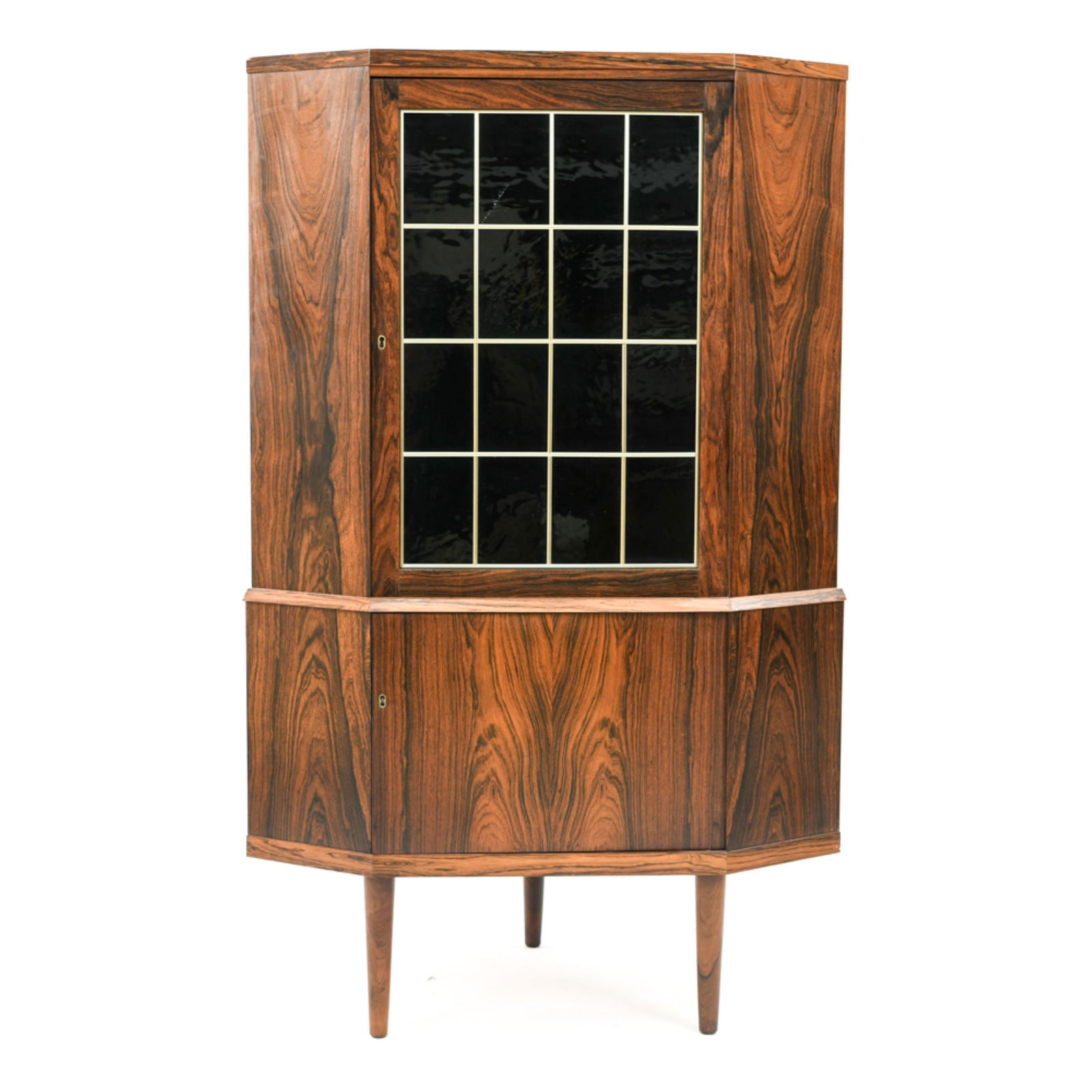 DANISH MID-CENTURY ROSEWOOD CORNER CABINET: Dimensions: H 54.75" x W 33.5" x D 21.5" Condition: Wear to some corners including crude chip repair. Slight separation to veneer upper right edge. Couple areas with slight veneer separations. GA032