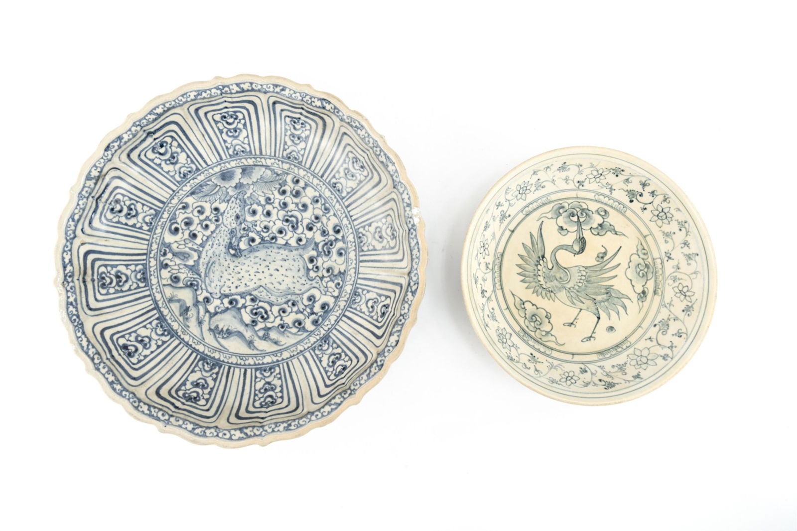 IMPORTANT VIETNAMESE ANNAMESE LOBED CHARGER: Blue and white deep charger with central design of deer in foliage surrounded by lappet and cloud designs. Second smaller stork dish, possibly reproduction. Dimensions: Largest: Dia: 13.25" x H 2.5" C