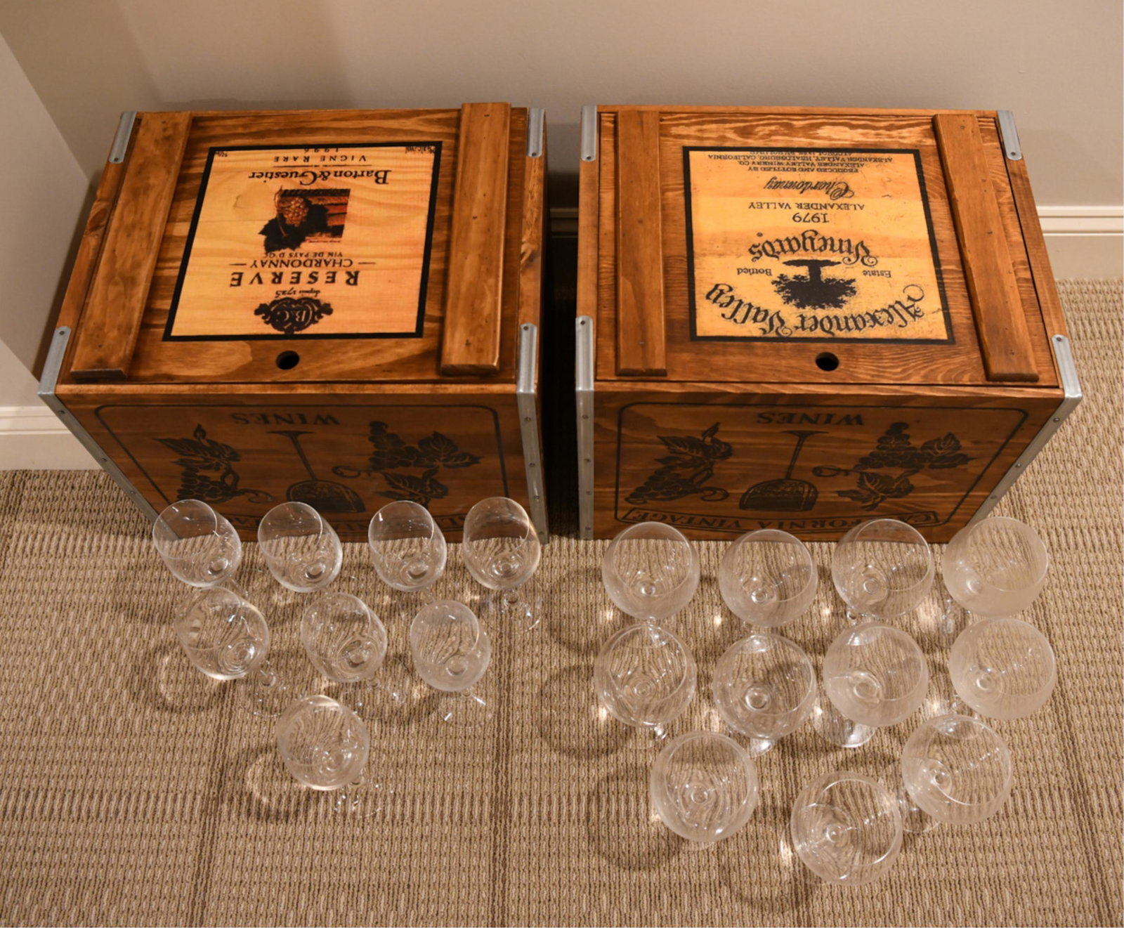 TIFFANY GLASS STEMWARE: Along with wooden wine boxes. (8) white wine glasses and (11) red wine glasses. Dimensions: (Taller) H 8.5" x Dia. 3" Condition: No issues to note.