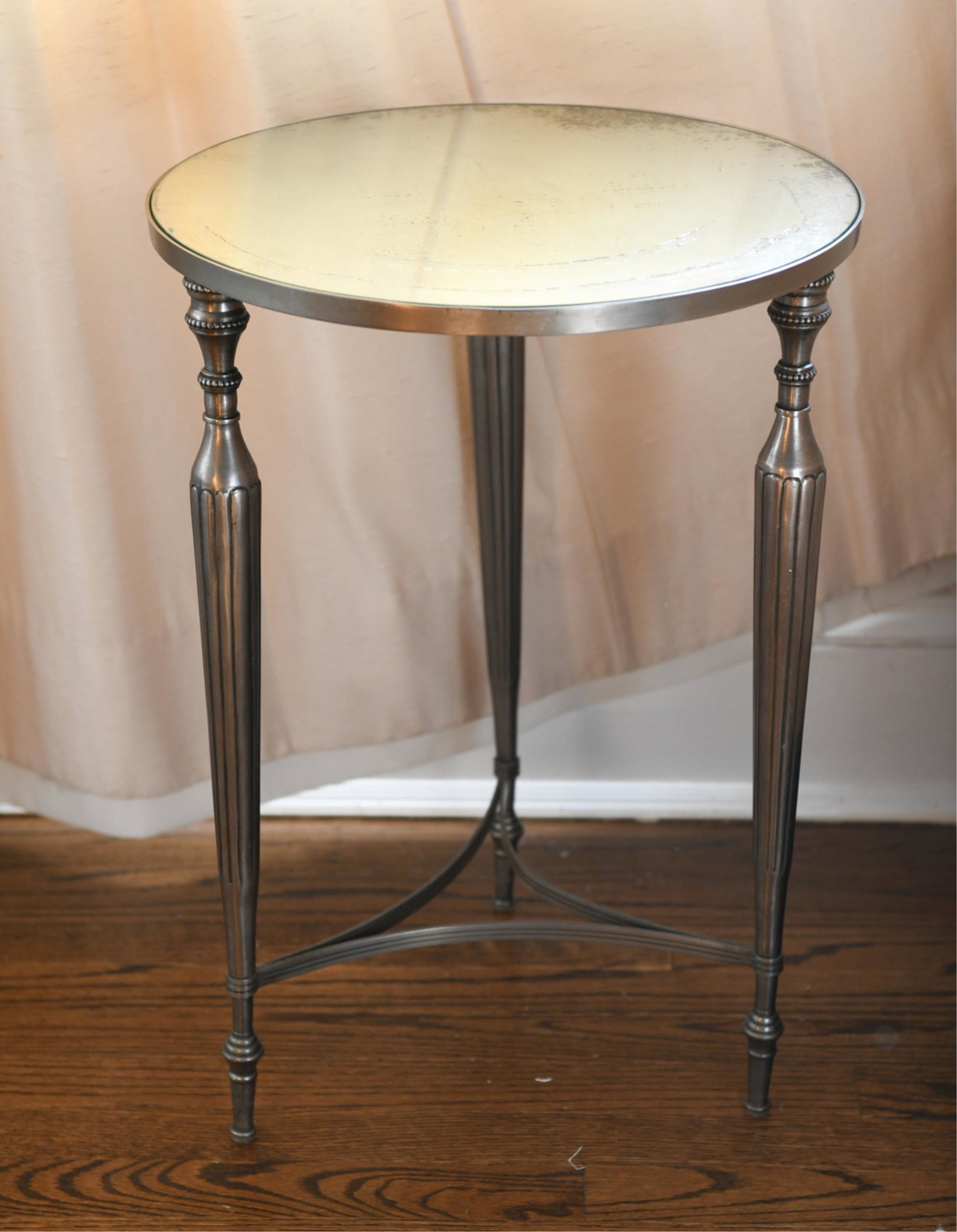 SMALL MIRROR TOP SIDE TABLE: Dimensions: H 23" x Dia. 16" Condition: Some intentional de-silvering to mirror.