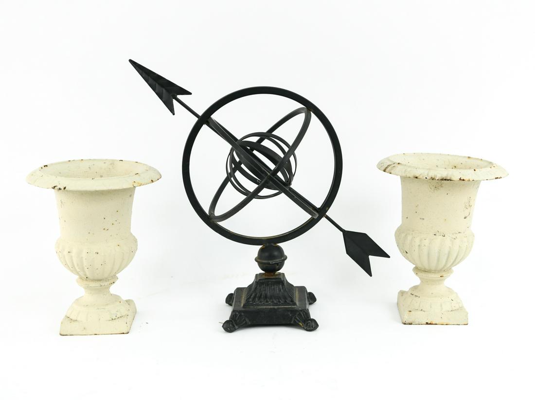 GROUPING OF VINTAGE DECORATIVE OBJECTS: Including two small urns and an armillary sphere. Dimensions: (Armillary) H 14" x W 14" x D 9" Condition: Some rusting. Armillary with bends.