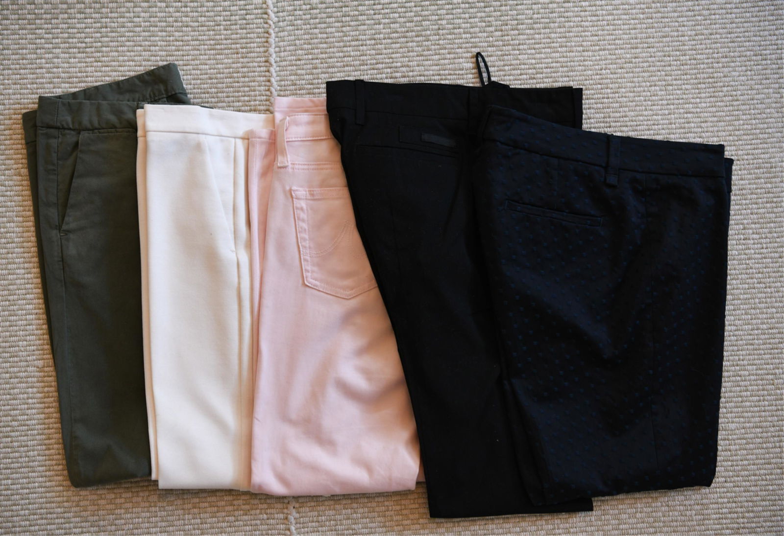 LADIES DESIGNER SLACKS: Including Nili Lotan, Adriano Goldschmie pink (26), Derek Lamb, off white wool blend (40), Shari's Place textured blue (42), Prada black (40). Condition: Used, showing light signs of use.