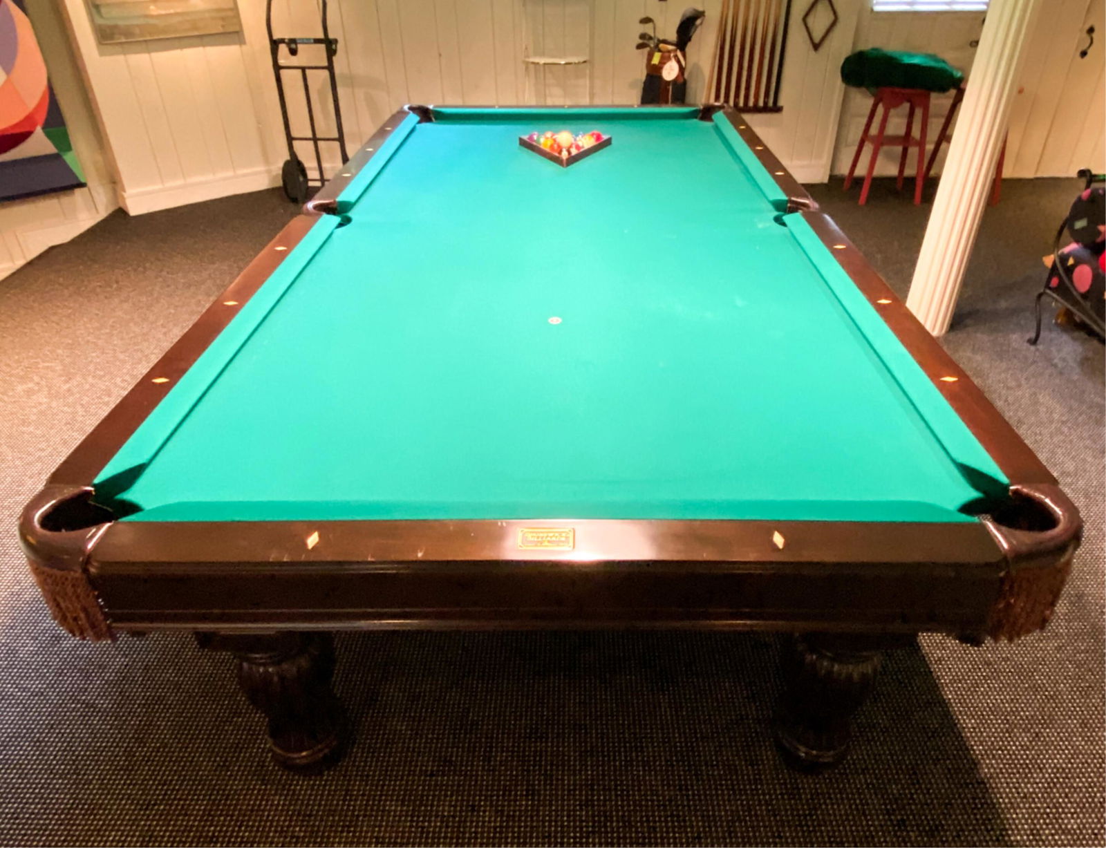 BRUNSWICK POOL TABLE: *Professional movers required to remove from basement* Original Brazilian Slate With Mop inlay and leather corner covers Access to outside, ten feet away Dimensions: H 32" x W 111" x D 61" Condition: