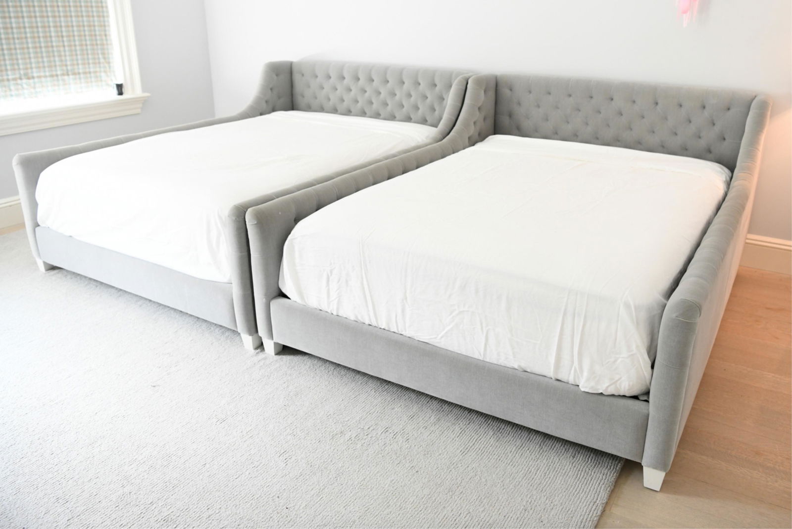 PAIR OF RESTORATION HARDWARE QUEEN BEDS: Tufted upholstery. Dimensions: (Each) H 37" x W 62" x D 78.5" Condition: Showing light signs of wear and use.