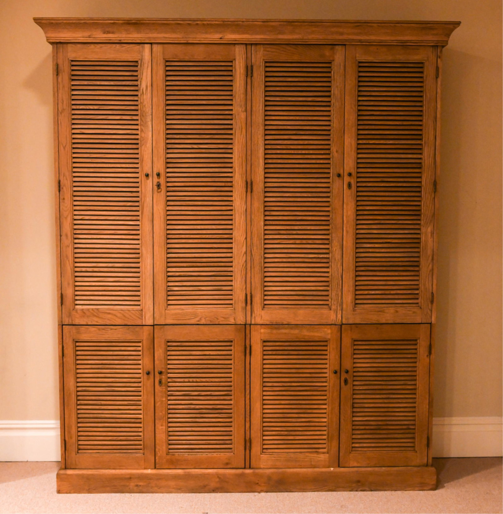 LARGE WALL CABINET: Contemporary stripped oak, two pieces Dimensions: H 90" x W 78" x D 20" Condition: Couple spots of rubbing along the base