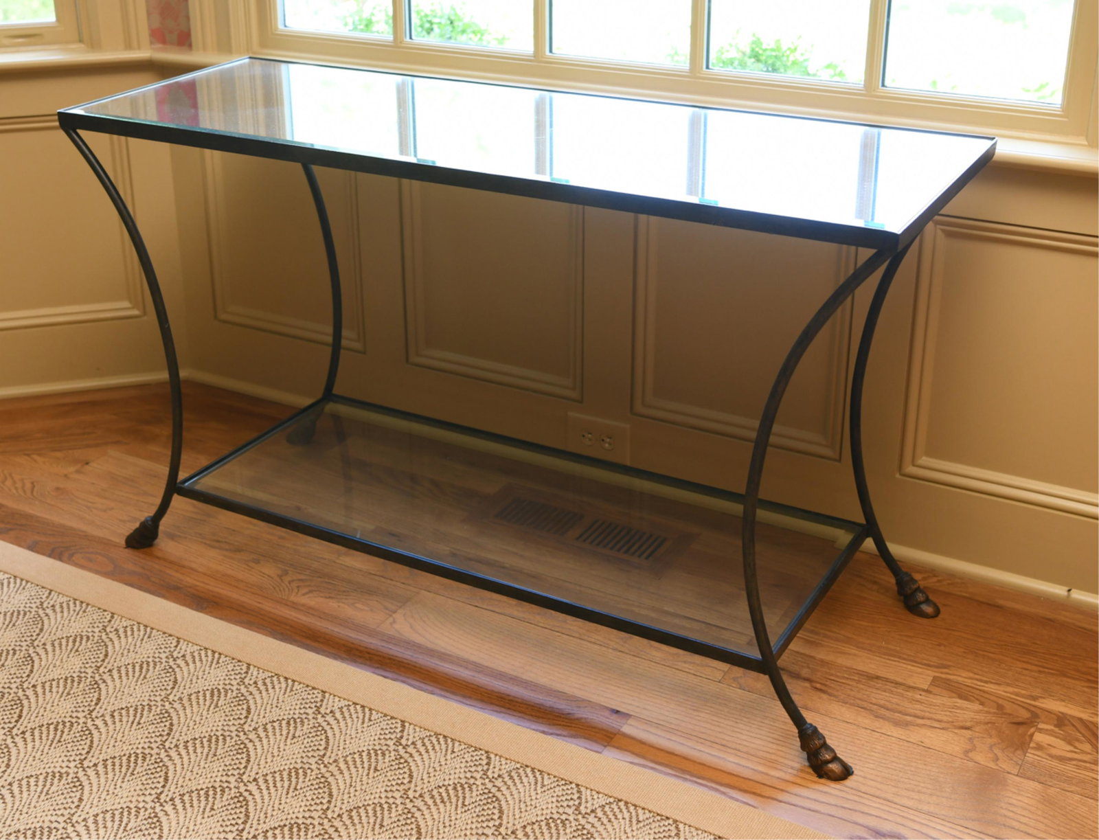 MIRRORED GLASS AND IRON CONSOLE TABLE: Dimensions: H 28.75“ x W 50“ x D 18“ Condition: Few losses to paint. Light scratches to glass.