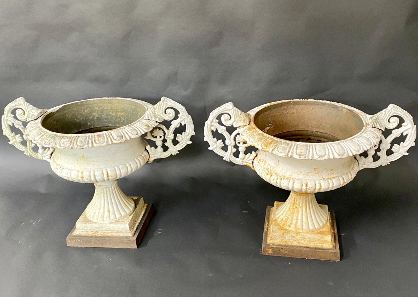 (2) LARGE CAST IRON HANDLED GARDEN URNS (1 of 11)