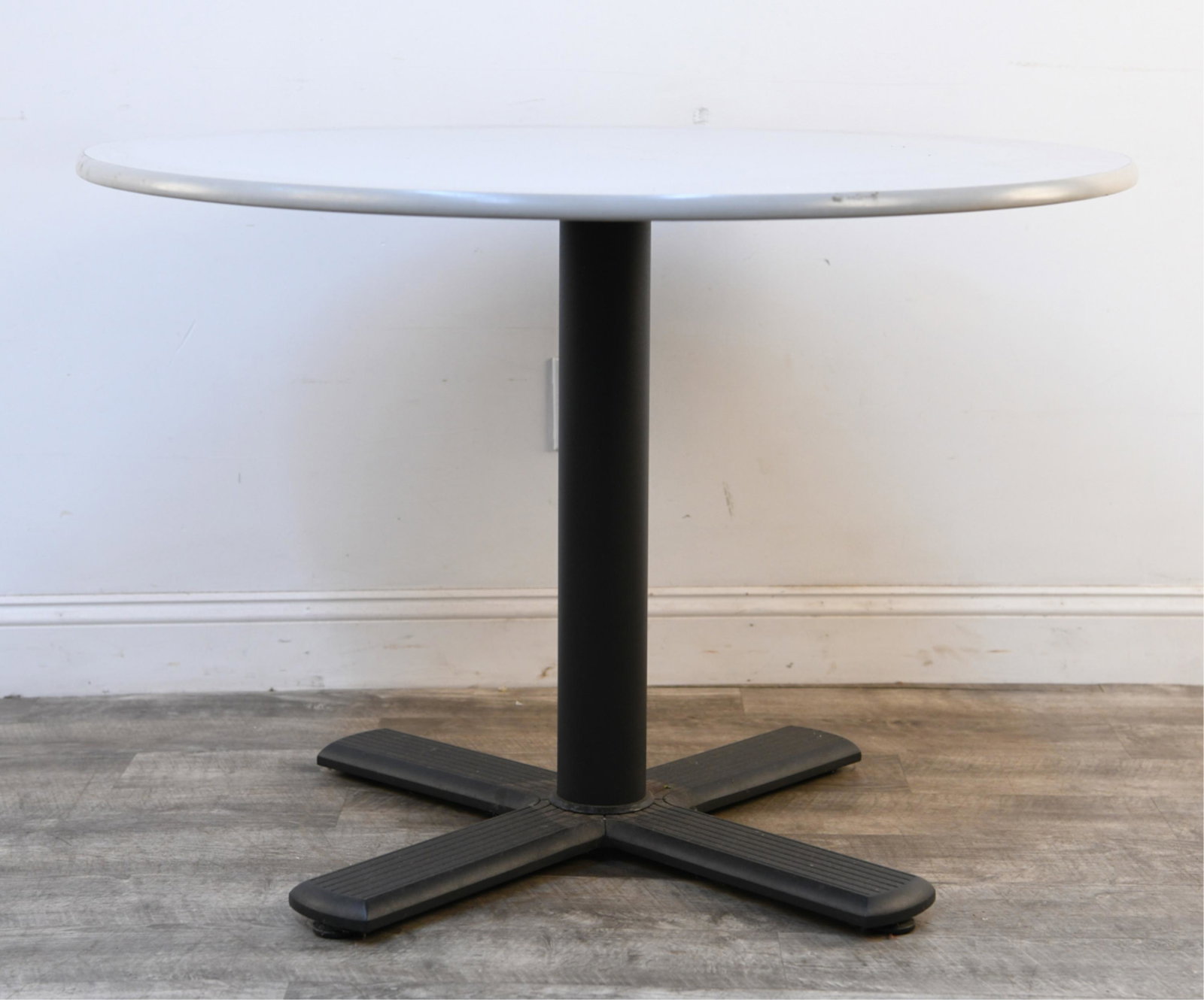 KNOLL ROUND OFFICE SIDE TABLE: Dimensions: H 29.25" x Dia. 42" Condition: Wear consistent with use including some scuffs to edges and surface scratches.