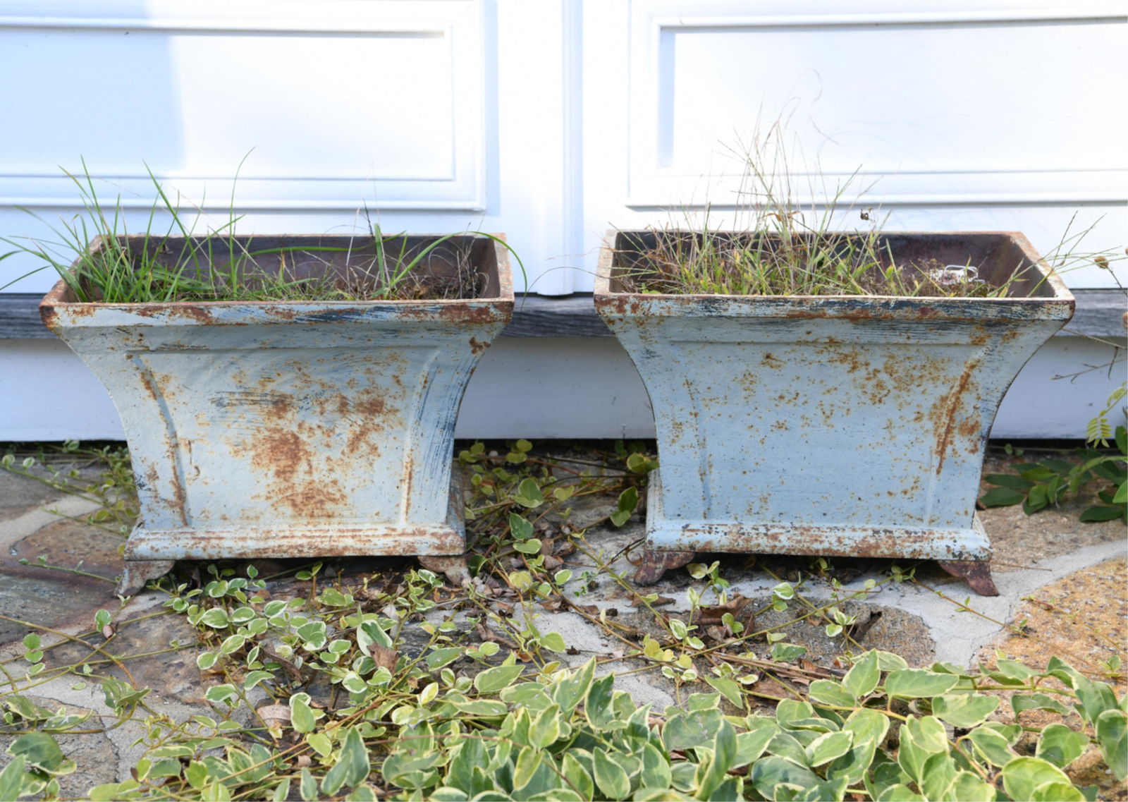 PAIR OF ANTIQUE CAST IRON PLANTERS (1 of 8)