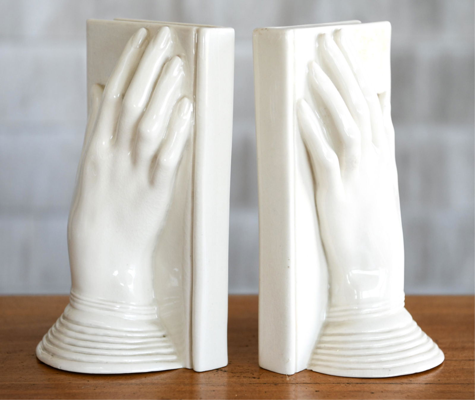 PAIR OF PORCELAIN HANDS BOOKENDS (1 of 7)
