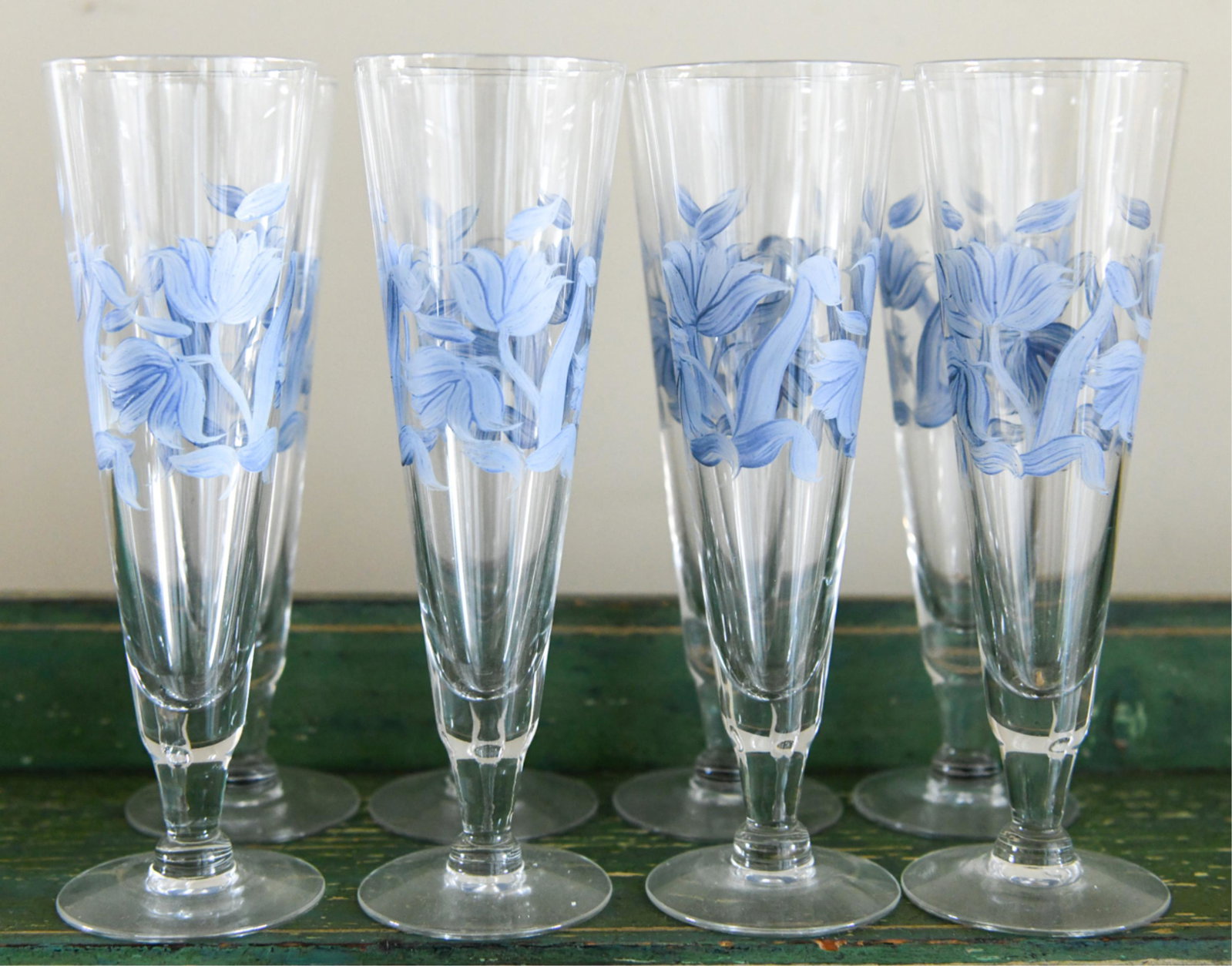 (8) HANDPAINTED WINE GLASSES: Hand painted with blue floral pattern. Dimensions: H 8.75" x Dia. 3" Condition: No issues to note