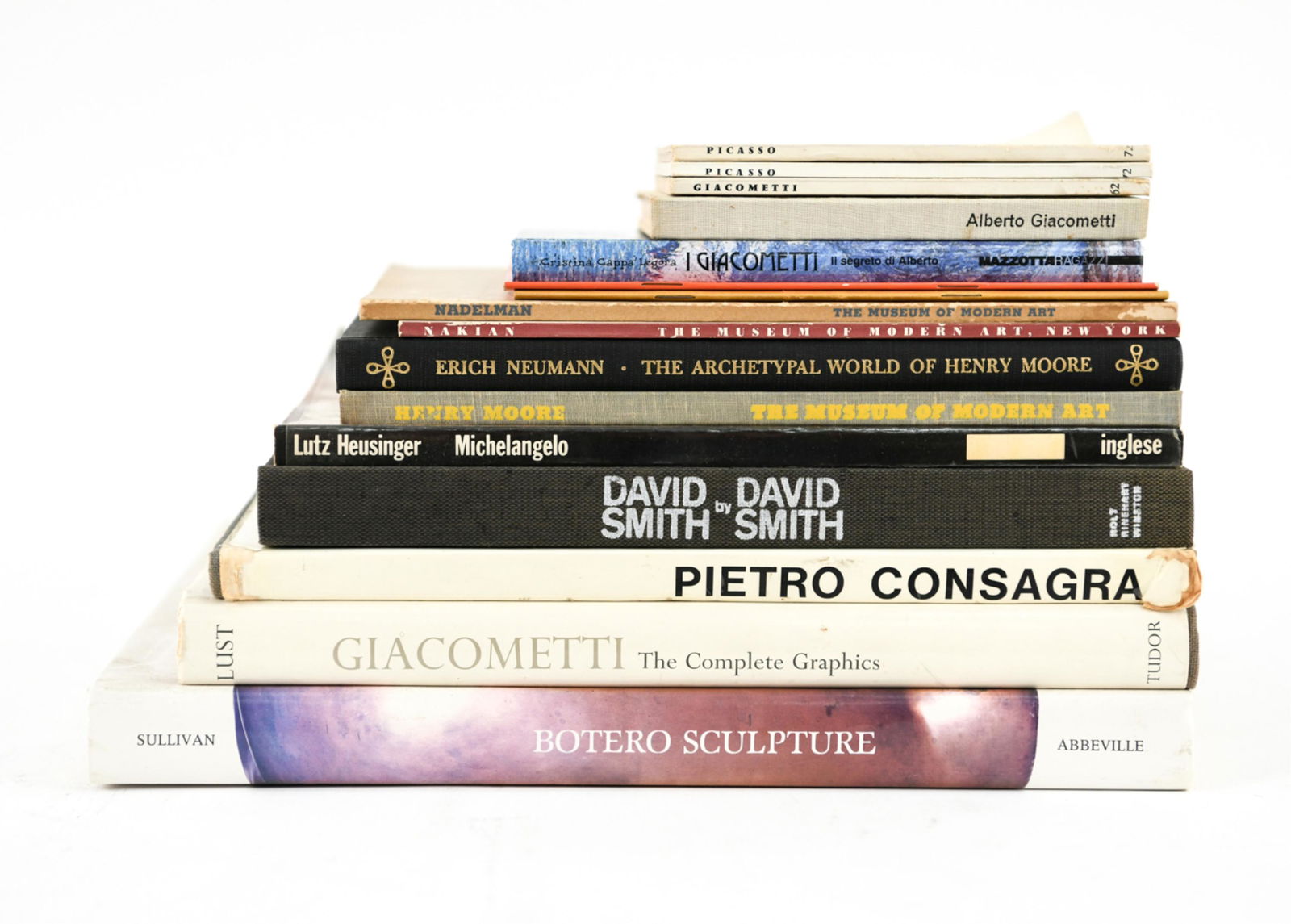 GROUPING OF ART BOOKS INCL. SCULPTORS: Including Giacometti, Michelangelo, David Smith, etc. Dimensions: (Largest) H 13.25" x W 11" Condition: Used. Wear and tear particularly to corners.