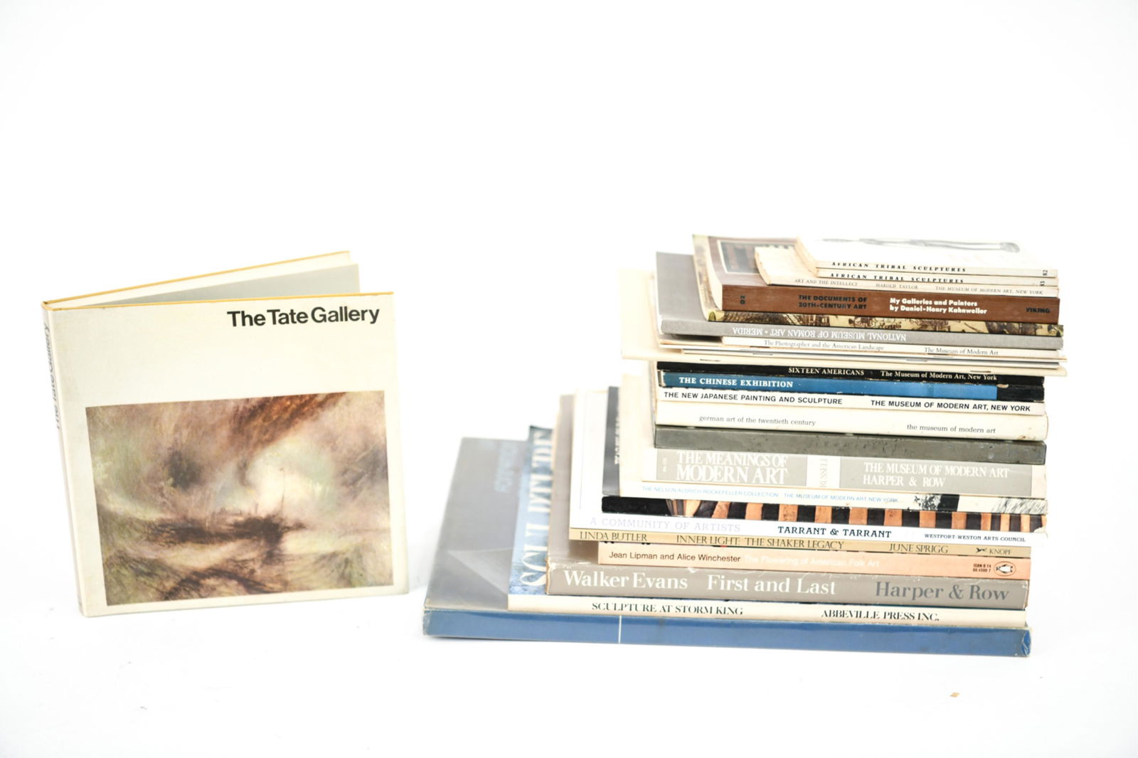 GROUPING OF ART BOOKS INCL. PHOTOGRAPHY & MODERN: Including: The Tate Gallery, Walker Evans, Nelson Aldrich Rockefeller Collection, etc. Dimensions: (Largest) H 15" x W 11" Condition: Wear and tear, bumps, used.