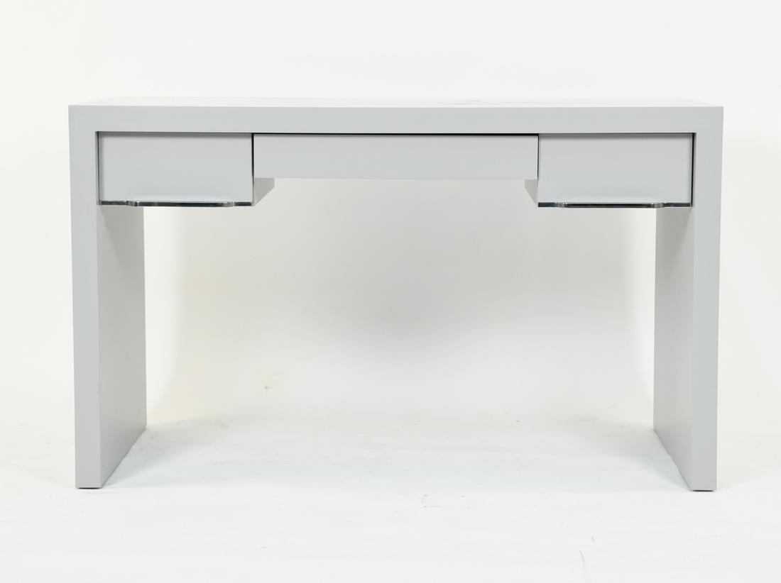 LORIN MARSH DESIGN PHOENIX DESK: Gray Lacquer desk with two drawers with polished steel hardware. Metal stamped on interior of drawer. Dimensions: H 30" x W 50" x D 22" Condition: Minor scuffs and scratches. Overall good condition.