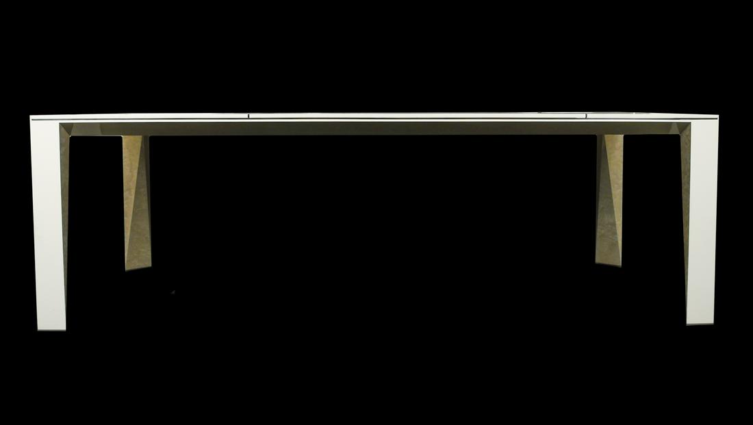 LORIN MARSH DESIGN FACET DINING TABLE: New York 2000s. White high-gloss lacquered dining table with inlaid, polished stainless-steel details. Legs faceted with gray polished bird's-eye maple veneer. Marked underneath. Dimensions: H 30.5" x