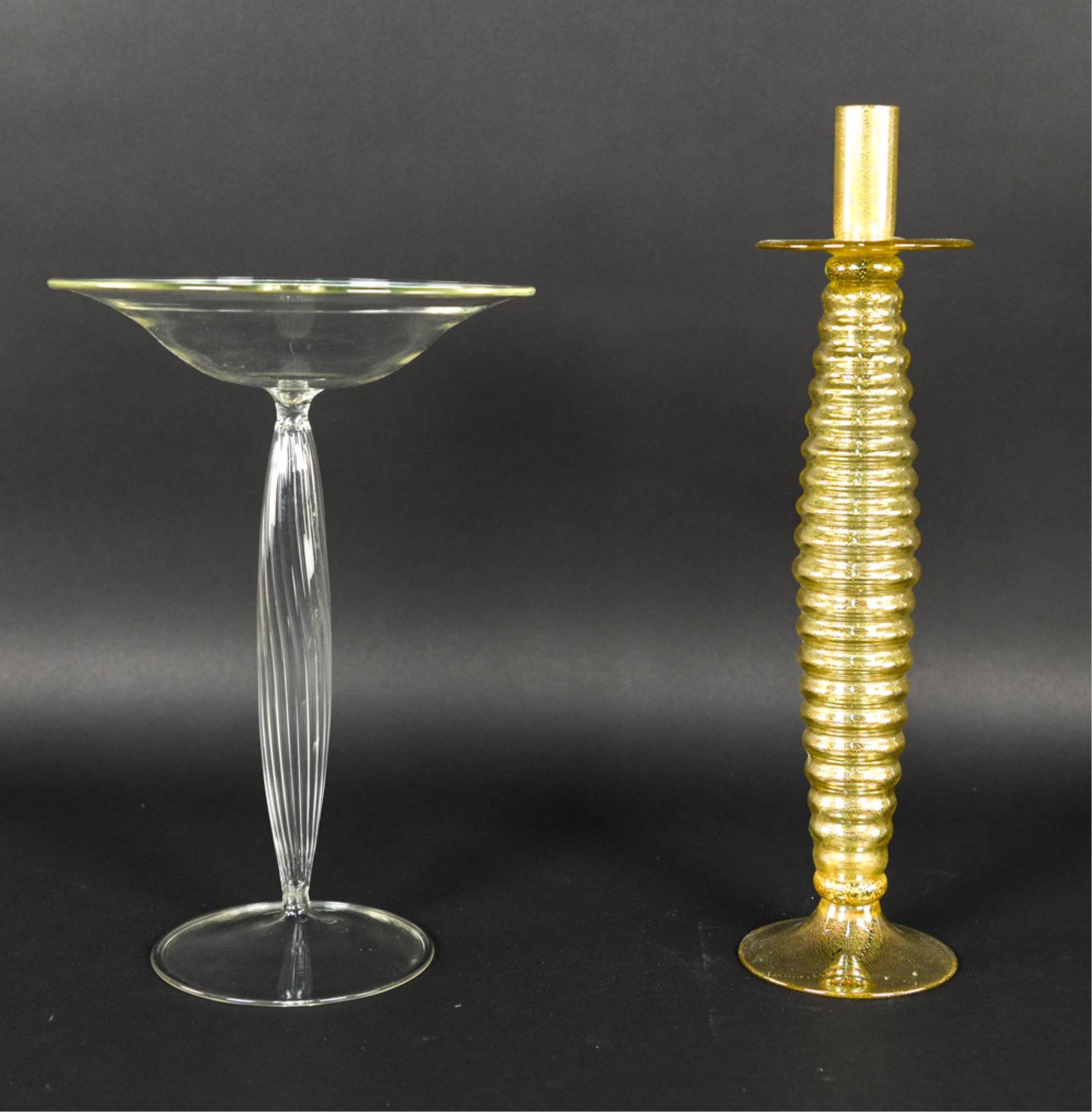 VENETIAN STYLE CANDLESTICK AND COMPOTE: Glass Venetian style candlestick and compote. Dimensions: H 17.5" x W " x D 4.5" Condition: Light scuffs and scratches.
