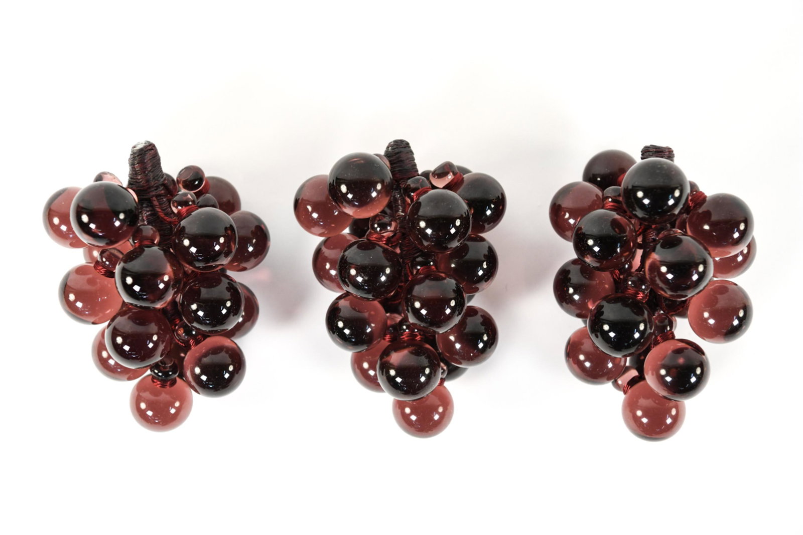 MURANO STYLE TABLETOP GRAPE SCULPTURES: Purple glass sculptures. Dimensions: H 7" x D 5" Condition: Very good condition.