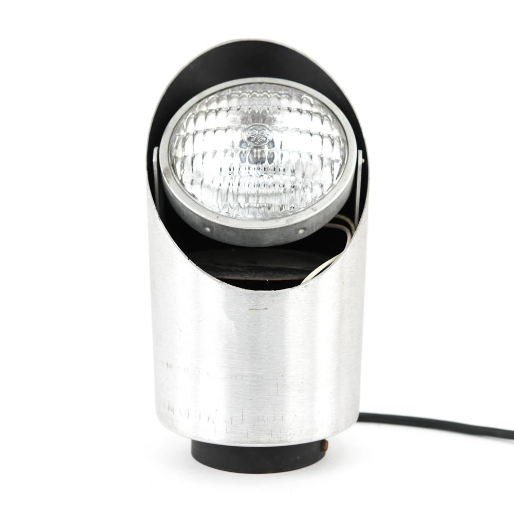 ONE-OF-A-KIND SPOT LIGHT TABLE LAMP: 1970's. Dimensions: H 10" x Dia: 5" Condition: Scuffs throughout, European wiring.