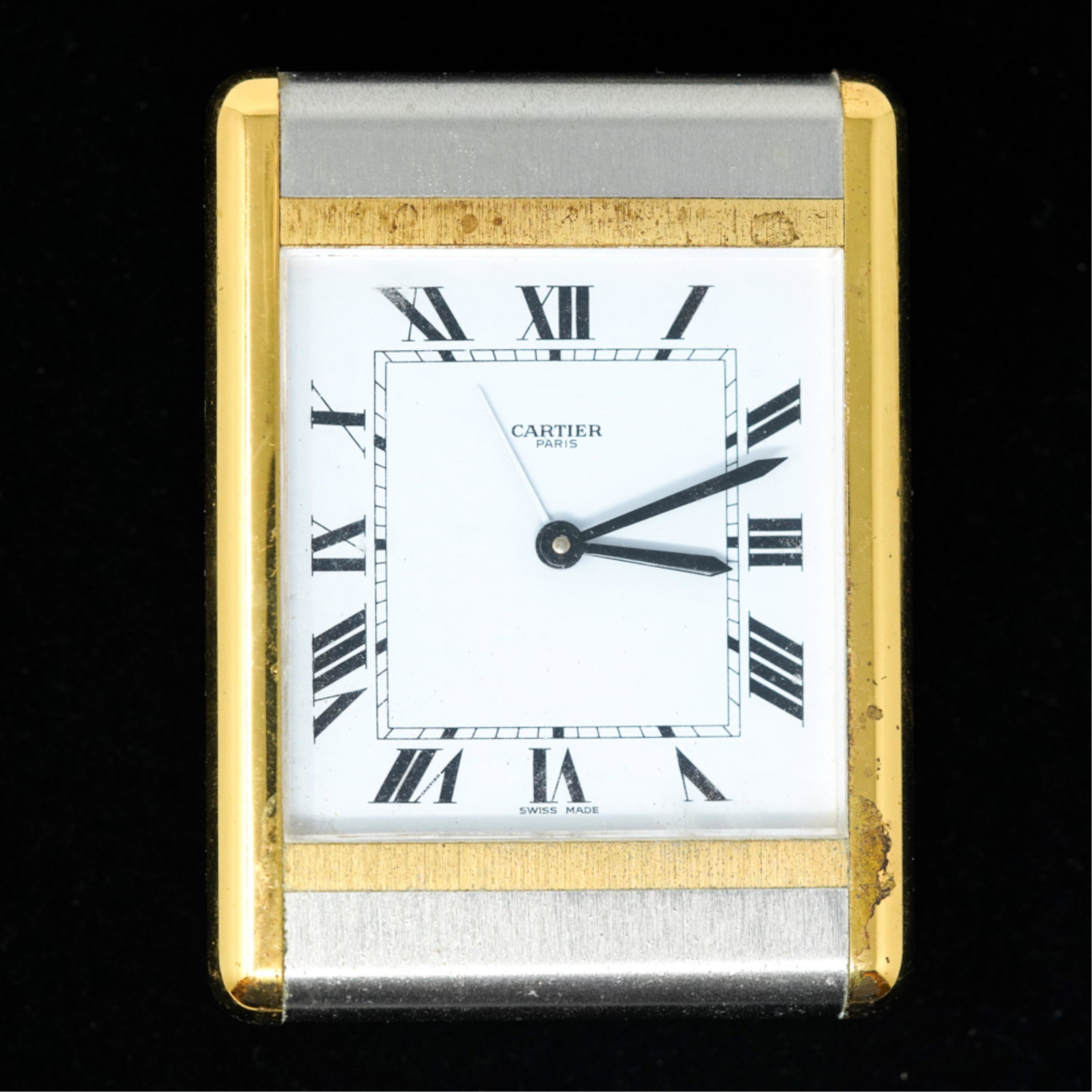 CARTIER TRAVEL CLOCK: Dimensions: L 4" x W 3" Condition: Surface scratching, not running.