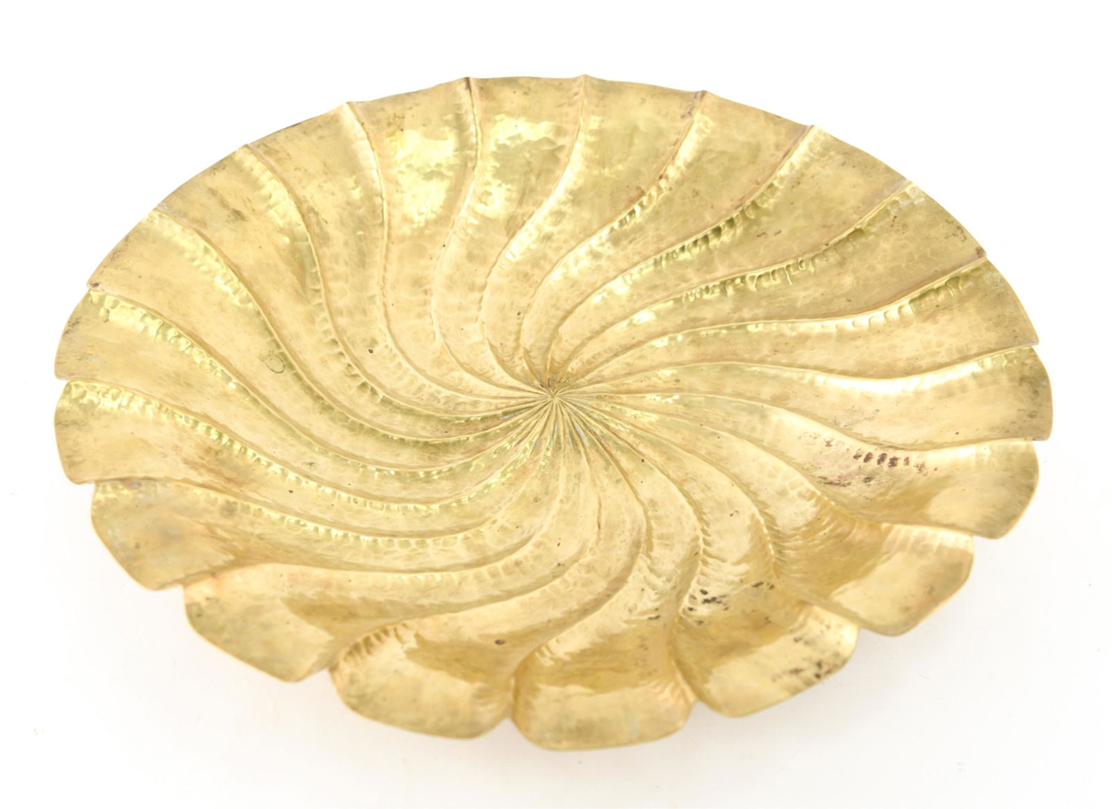 ARTS AND CRAFTS BRASS CHARGER: Hammered, solid brass, "J. Braun” with crossed awl and hammer mark, Ca. 1930’s. Dimensions: H 2.25" x Dia: 18" Condition: Polished, very minor crack to brass.