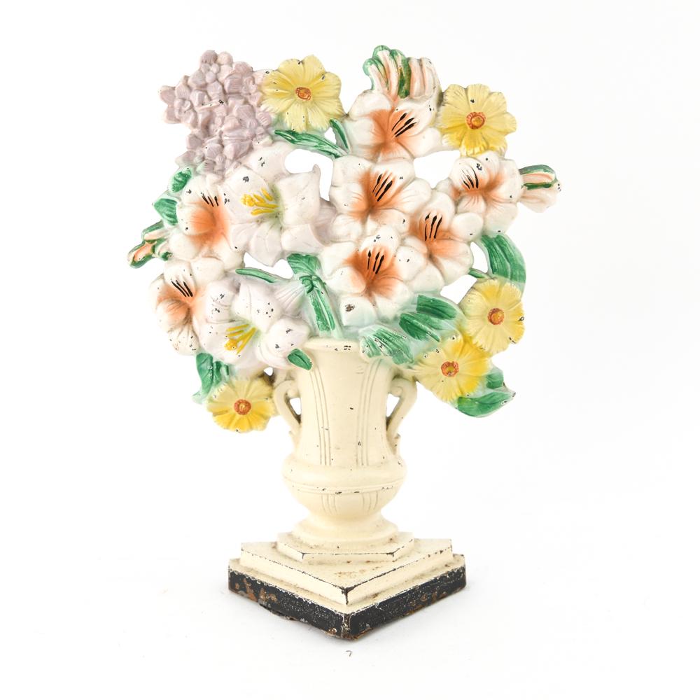 HUBLEY #489 GLADIOLUS CAST IRON DOOR STOP: Gladiolus in vase. Dimensions: H 10.25" x W 8" Condition: Small chips to paint.