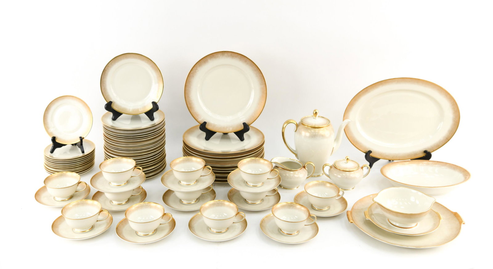 ROSENTHAL "STAR DUST" PORCELAIN SERVICE: Mid-Century Modern dinnerware by Rosenthal. "Stardust" pattern was produced in Germany 1963 - 1965. Service for 12. 12 10.25" plates, 26 7.75" plates, 12 6.25" plates, 12 6" saucers, 12 cups, coffee p